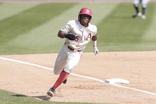 WholeHogSports - Tennessee walks off Arkansas to even series