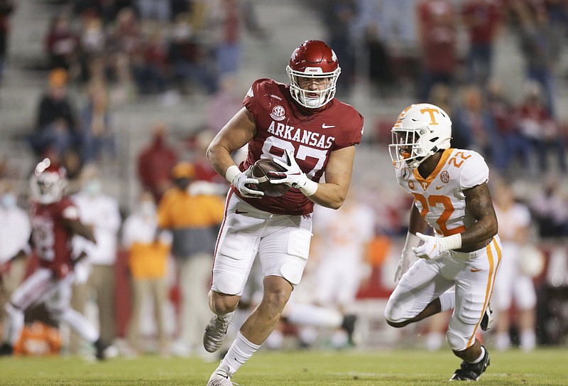 Arkansas tight end Blake Kern (87) carries the ball, Saturday, November 7, 2020 during the second quarter of a football game at Donald W. Reynolds Razorback Stadium in Fayetteville. Check out nwaonline.com/201108Daily/ for today's photo gallery. .(NWA Democrat-Gazette/Charlie Kaijo)