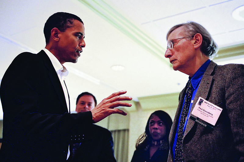 Then-Illinois state Sen. Barack Obama talks in 2004 with Paul Greenberg, who at the time was the editorial page editor for the Arkansas Democrat-Gazette. Before joining the statewide newspaper, Greenberg held the same position at the Pine Bluff Commercial for 30 years. The two were at the National Conference of Editorial Writers meeting held in Chicago where Obama gave a speech during his campaign for U.S. Senate. 
(Arkansas Democrat-Gazette file photo)