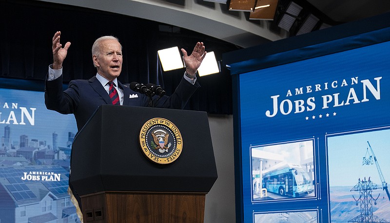 President Joe Biden said Wednesday that “compromise is inevitable,” but he so far is not backing down from insisting that his broad spending proposal be offset by corporate tax increases. More photos at arkansasonline.com/48potus/. (AP/Evan Vucci)