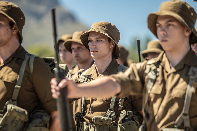 Nicholas van der Swart (Kai Luke Brummer) is a 16-year-old trying to serve out his two years of compulsory military service in 1981 South Africa without revealing his true nature in Oliver Hermanus’ military drama “Moffie.”