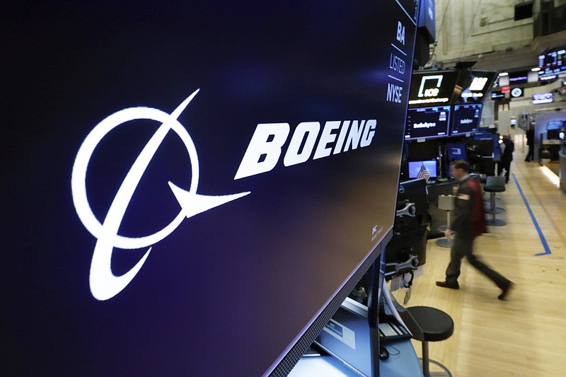 The Boeing logo appears above a trading post on the floor of the New York Stock Exchange last year. Boeing shares fell about 1% Friday after four U.S. airlines grounded dozens of Boeing Max airliners because of a possible electrical problem.
(AP/Richard Drew)