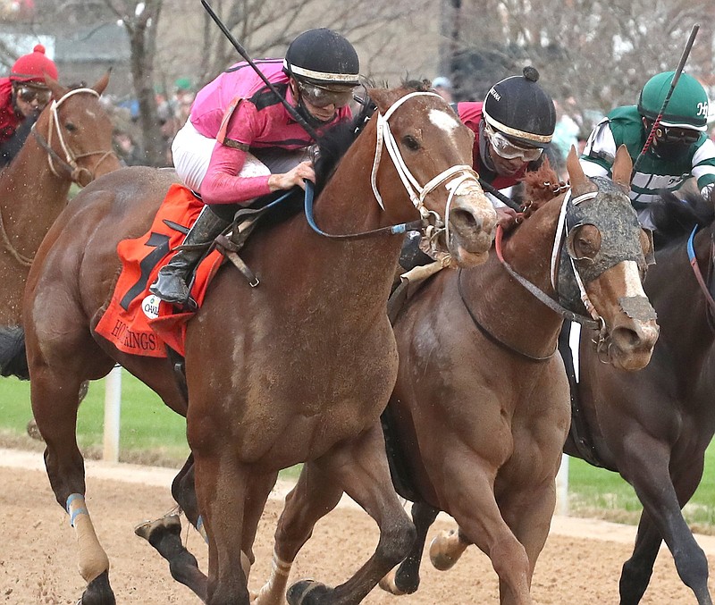 C Z Rocket and jockey Florent Geroux (left) outdueled Whitmore and Ricardo Santana Jr. to win the Hot Springs Stakes on March 13 at Oaklawn Racing Casino Resort in Hot Springs. They meet at Oaklawn again today in the Count Fleet Sprint Handicap.
(The Sentinel-Record/Richard Rasmussen)
