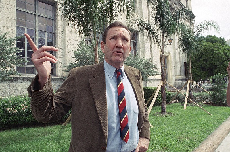 Former U.S. Attorney General Ramsey Clark gestures during a news conference outside the Federal Courthouse in Miami, Fla., in this April 3, 1990, file photo. (AP/Marc Pesetsky)