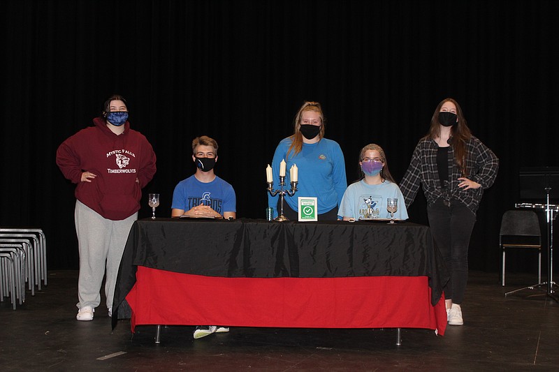 A few of the cast members of “Check Please!” - Heather Hudson, Clayton Evers, Ellery Paliculict, Madeline Couture and Hannah Elizabeth. The play will be performed on April 15 and 17. (Matt Hutcheson-News-Times)