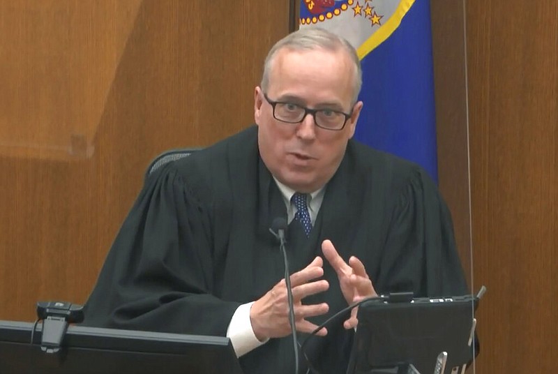 In this image from video, Hennepin County Judge Peter Cahill discusses motions before the court Monday, April 12, 2021, in the trial of former Minneapolis police Officer Derek Chauvin at the Hennepin County Courthouse in Minneapolis. Chauvin is charged in the May 25, 2020 death of George Floyd. (Court TV via AP, Pool)