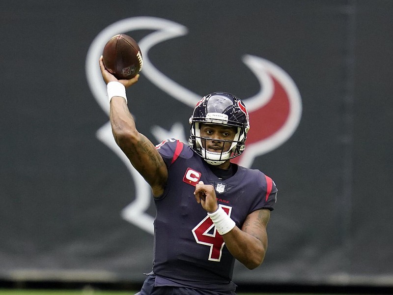 In this Dec. 27, 2020, file photo, Houston Texans quarterback Deshaun Watson throws a pass during an NFL football game against the Cincinnati Bengals in Houston. On Friday, a judge has ordered that the name of one of the 22 women who have filed lawsuits accusing Watson of sexual assault and harassment must be made public. (AP Photo/Matt Patterson, File)