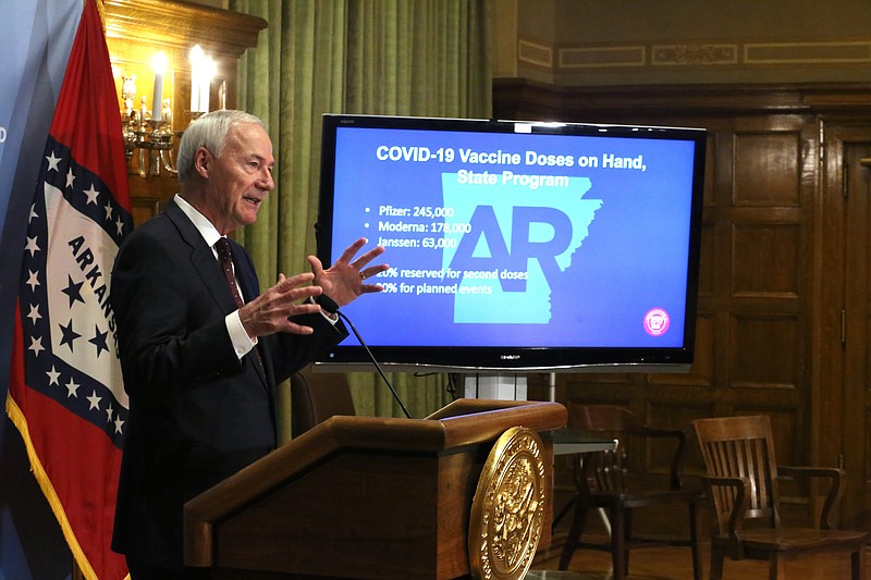 Gov. Asa Hutchinson talks about vaccine administrations during the weekly COVID-19 update on Tuesday, April 13, at the state Capitol in Little Rock. (Arkansas Democrat-Gazette/Thomas Metthe)