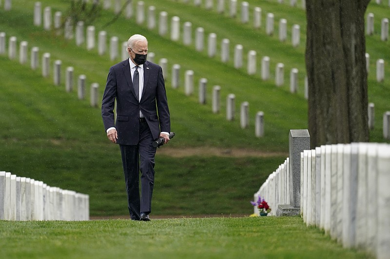 President Joe Biden visits Section 60 of Arlington National Cemetery in Arlington, Va., on Wednesday, April 14, 2021. Biden announced the withdrawal of the remainder of U.S. troops from Afghanistan by Sept. 11, 2021, the 20th anniversary of the terrorist attacks on America. (AP Photo/Andrew Harnik)