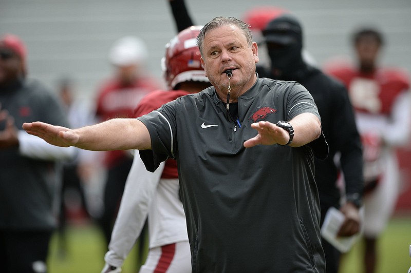 Arkansas coach Sam Pittman directs his players Saturday, April 3, 2021, during a scrimmage at Razorback Stadium in Fayetteville. 
(NWA Democrat-Gazette/Andy Shupe)