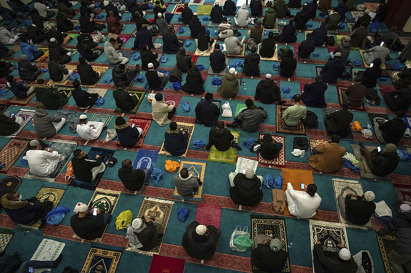 Worshipers gather for a Ramadan service Wednesday at a mosque in east London after the holy month had to be observed last year without the usual community prayer gatherings.
(AP/Aaron Chown)