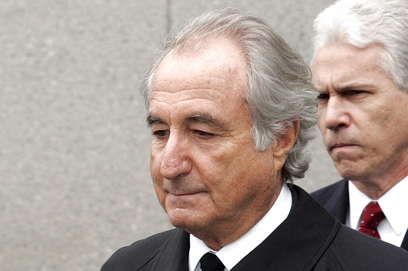 FILE - In this March 10, 2009, file photo, former financier Bernie Madoff leaves federal court in Manhattan, in New York. (AP/David Karp, File)