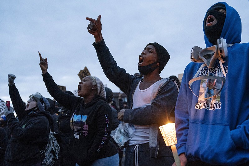 People were gathered Thursday at the Police Department in Brooklyn Center, Minn., for another protest over the fatal police shooting of Daunte Wright.
(AP/John Minchillo)