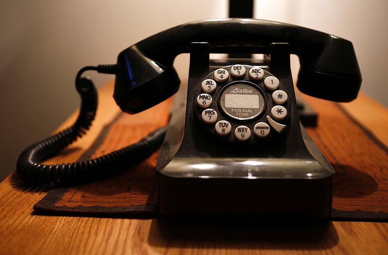 A push-button landline telephone is shown in this April 14, 2016, file photo. (AP/Robert F. Bukaty)