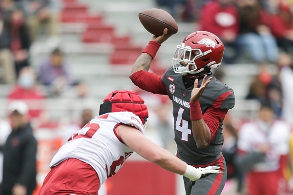 Arkansas quarterback Malik Hornsby (4) throws a pass, Saturday, April 17, 2021 during the second quarter of the Red-White spring football game at Razorback Stadium in Fayetteville. Check out nwaonline.com/210418Daily/ for the photo gallery.