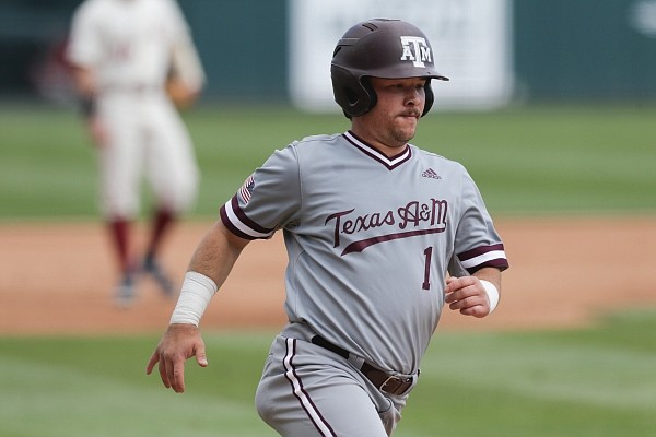 Texas A&M infielder Ty Coleman (1) runs home for a score, Sunday, April 18, 2021 during the fourth inning of a baseball game at Baum-Walker Stadium in Fayetteville. Check out nwaonline.com/210419Daily/ for the photo gallery.