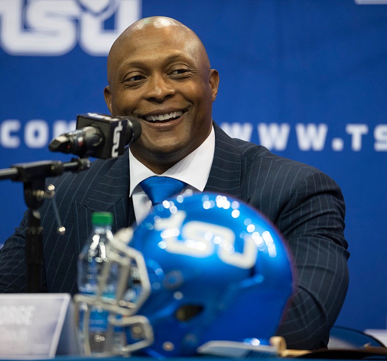 New Tennessee State University NCAA college football head coach Eddie George smiles during a press conference in Nashville on Tuesday, April 13. (George Walker/The Tennessean via AP)