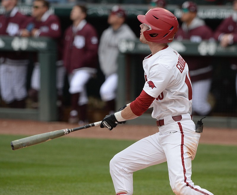 Arkansas designated hitter Matt Goodheart watches the flight of the ball Saturday, April 17, 2021, after hitting a solo home run during the second inning of the RazorbacksÕ 13-0 win over Texas A&M at Baum-Walker Stadium in Fayetteville. Visit nwaonline.com/210418Daily/ for today's photo gallery. .(NWA Democrat-Gazette/Andy Shupe)