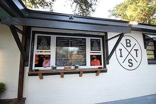 Workers at Braised in the South restaurant on Johns Island, S.C., wait on customers in September. The business is having trouble finding workers during the pandemic.
(AP/Hannah Albert)