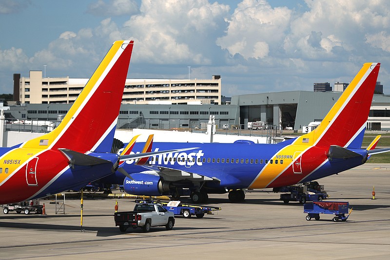 Southwest Airlines jets are shown last year at Love Field in Dallas. Airlines are anticipating a significant rise in traffic at the airport in the coming months.
(AP)