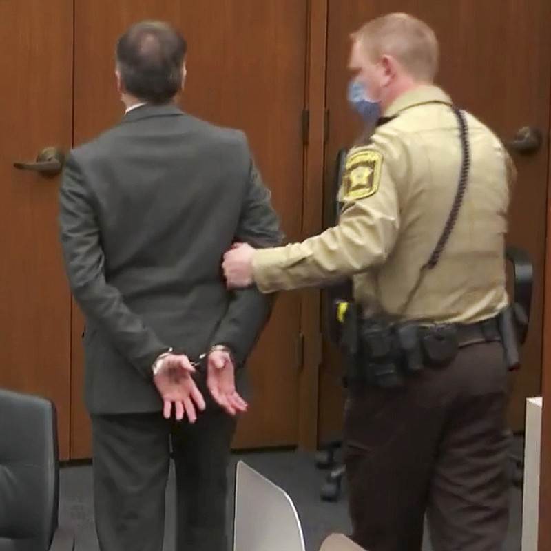 In this image from video, former Minneapolis police Officer Derek Chauvin, center, is taken into custody as his attorney, Eric Nelson, left, looks on, after the verdicts were read at Chauvin's trial for the 2020 death of George Floyd, Tuesday, April 20, 2021, at the Hennepin County Courthouse in Minneapolis, Minn. (Court TV via AP, Pool)