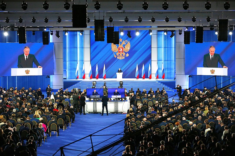 Russian President Vladimir Putin (center) gives his annual state of the nation address Wednesday in Moscow.
(AP/Alexander Zemlianichenko)