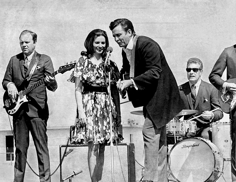 Arkansas Democrat-Gazette file photo - 4/11/1969 - Johnny Cash during appearance at Arkansas' Cummins Prison. Singing with wife June Carter Cash.