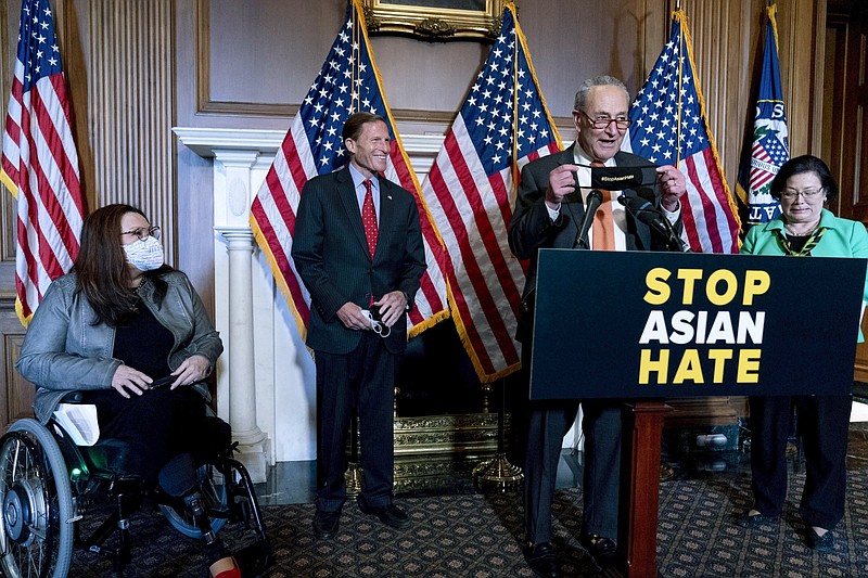 Senate Majority Leader Charles Schumer of N.Y., accompanied by Sen. Mazie Hirono, D-Hawaii, Sen. Tammy Duckworth, D-Ill., and Sen. Richard Blumenthal, D-Conn., speaks at a Capitol Hill news conference Thursday after the Senate passed a COVID-19 Hate Crimes Act.
(AP/Andrew Harnik)