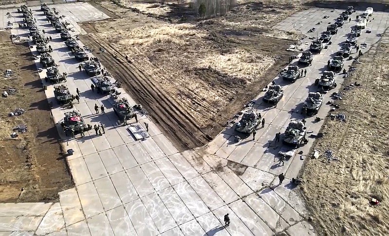 Russian military vehicles move Thursday during drills in Crimea where the Russian military had been conducting large-scale drills in a show of force amid tensions with Ukraine.
(AP/Russian Defense Ministry Press Service)