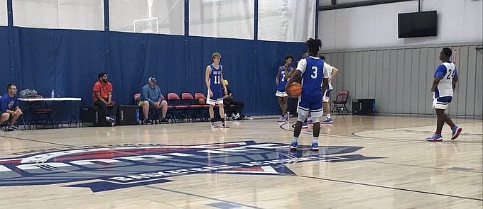 The 15-under HoopLife squad during a recent practice.