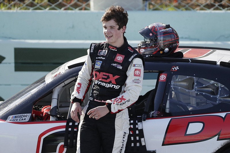 Harrison Burton gets out of his car after winning a NASCAR Xfinity Series auto race Saturday, June 13, 2020, in Homestead, Fla. 
(AP Photo/Wilfredo Lee)