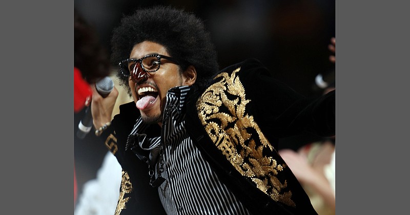 Greg "Shock G" Jacobs, leader for Digital Underground, performs "The Humpty Dance" as Humpty Hump during a halftime appearance in the Detroit Pistons' NBA basketball game against the Denver Nuggets in Denver in this Feb. 25, 2008, file photo. (AP/David Zalubowski)