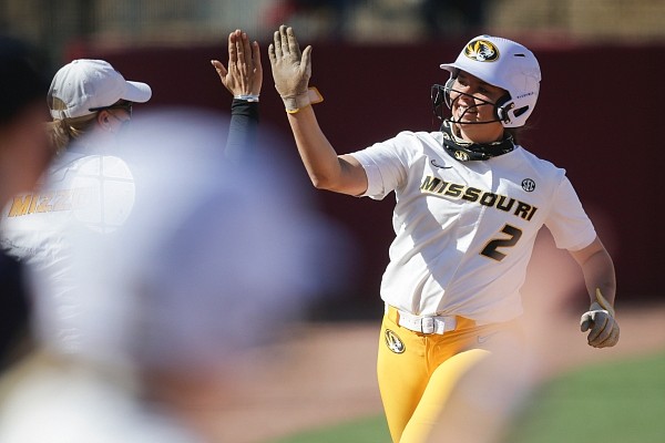 Missouri infielder Kendyll Bailey (2) scores, Sunday, April 25, 2021 during a softball game at Bogle Park in Fayetteville. Check out nwaonline.com/210426Daily/ for the photo gallery. Missouri infielder Kendyll Bailey (2) scores, Sunday, April 25, 2021 during a softball game at Bogle Park in Fayetteville. Check out nwaonline.com/210426Daily/ for the photo gallery.
