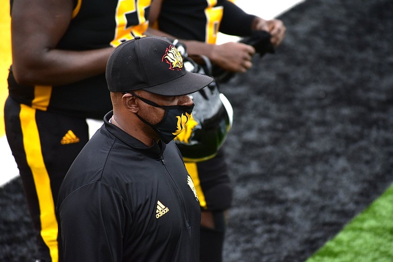 UAPB Coach Doc Gamble and players head into the locker room for halftime of their April 17 win over Prairie View A&M at Simmons Bank Stadium. (Pine Bluff Commercial/I.C. Murrell)