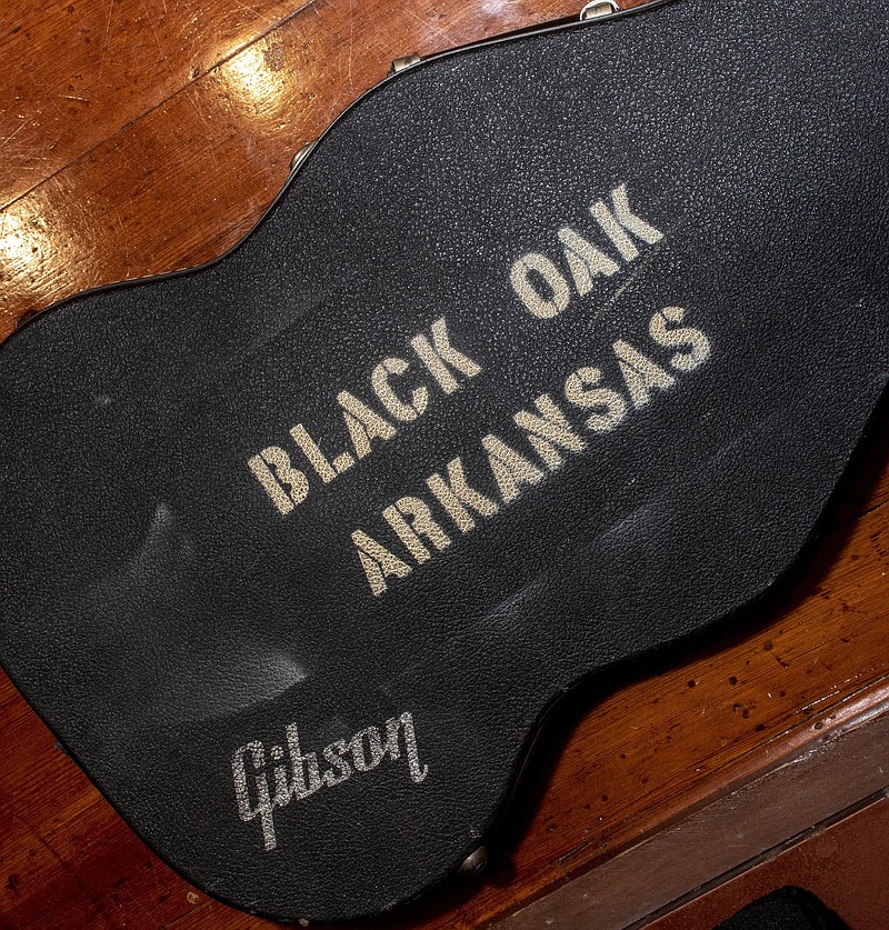FILE — A Black Oak Arkansas stenciled case is shown at the The Old State House Museum's exhibit "Play It Loud: Concerts at Barton Coliseum" in this April 15, 2021 file photo. (Arkansas Democrat-Gazette/Cary Jenkins)