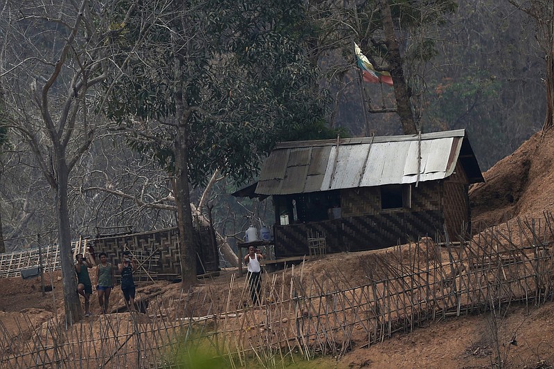 Burmese soldiers stand in a small army camp in late March near the border of Burma and Thailand. Government forces are targeting Kachin and Karen forces that oppose the military seizure of power.
(AP/Sakchai Lalit)