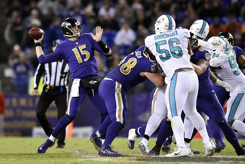 Baltimore Ravens quarterback Ryan Mallett (15) throws to a receiver in the second half of an NFL football game against the Miami Dolphins, Thursday, Oct. 26, 2017, in Baltimore. (AP Photo/Gail Burton)