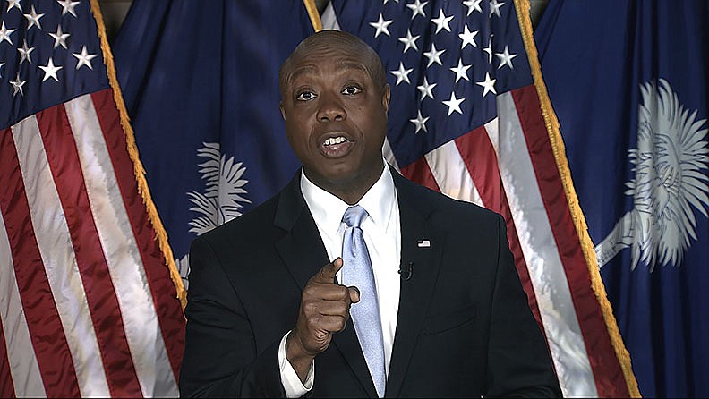 Sen. Tim Scott delivered Republicans’ central political criticism of President Joe Biden, that he campaigned as a uniter and a moderate but has governed as a liberal relying only on Democratic lawmakers.
(AP/Senate Television)