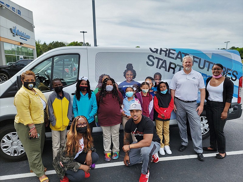 Boys & Girls Club of Jefferson County participants thanked Trotter Ford Lincoln officials and admired their newly wrapped van. 
(Special to The Commercial/Boys & Girls Club)
