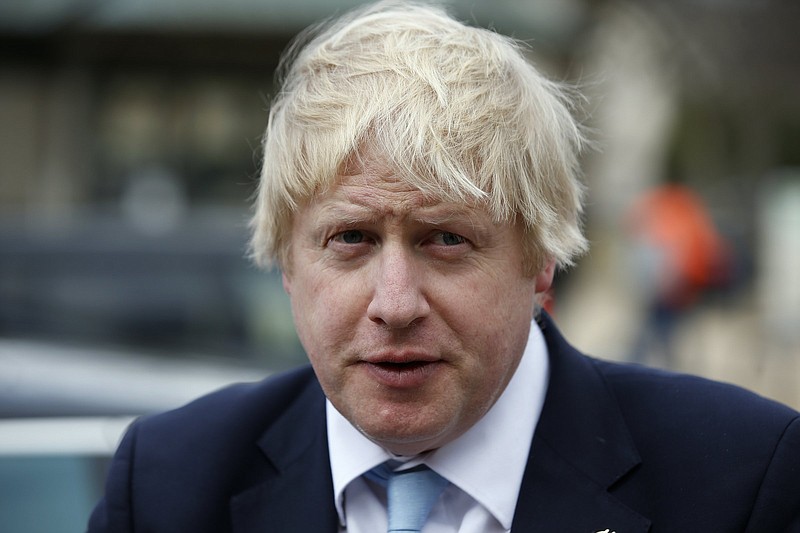 In this file photo Britain's Prime Minister Boris Johnson is shown speaking with the media before a visit to the Smithsonian National Air and Space Museum, Thursday, Feb. 12, 2015 in Washington. 
(AP Photo/Alex Brandon)