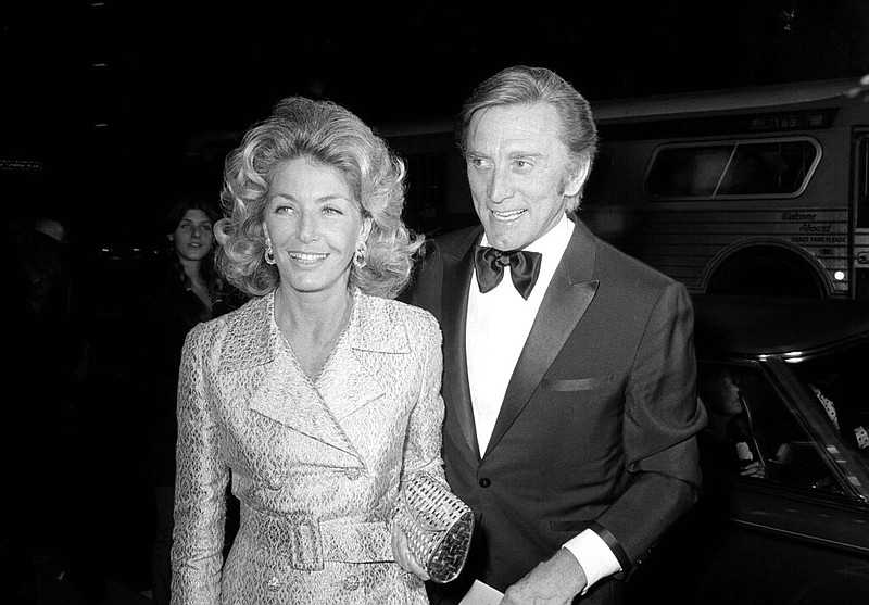Actor Kirk Douglas and his wife, Anne, attend the premiere of "Fiddler on the Roof" in Los Angeles in this Nov. 5, 1971, file photo. (AP/Harold Filan)