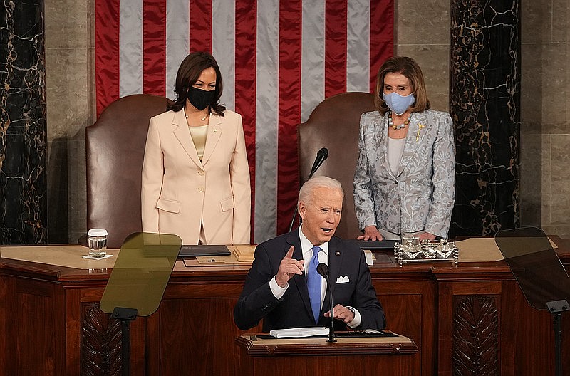“America is ready for takeoff. We are working again, dreaming again, discovering again. Leading the world again,” President Joe Biden proclaimed in his address Wednesday evening. Vice President Kamala Harris (left) made history by taking her place at the podium beside House Speaker Nancy Pelosi. (The New York Times/Doug Mills)