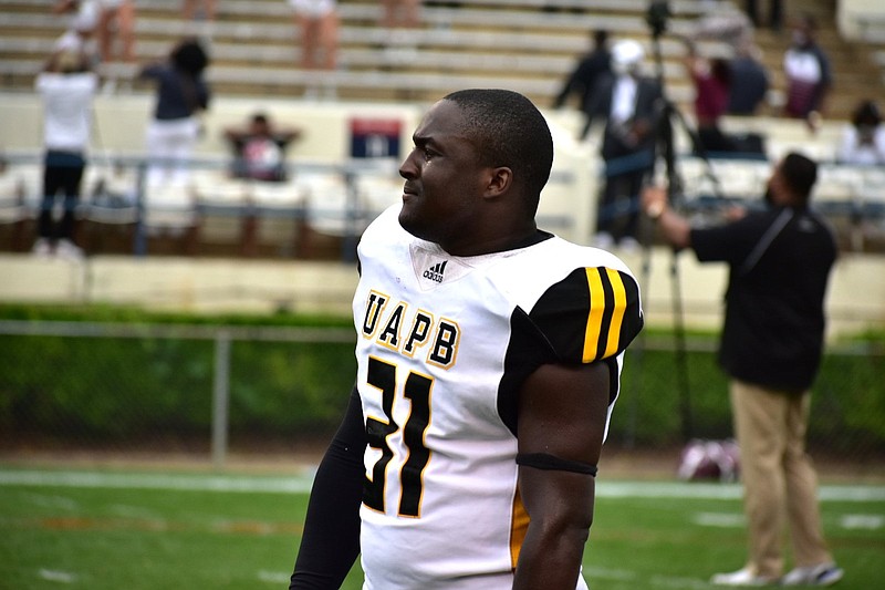 Linebacker Isaiah Singleton reacts after UAPB’s loss to Alabama A&M in the Southwestern Athletic Conference Championship Game on Saturday in Jackson, Miss. The Golden Lions committed a season-high 13 penalties for 139 yards.
(Pine Bluff Commercial/I.C. Murrell)