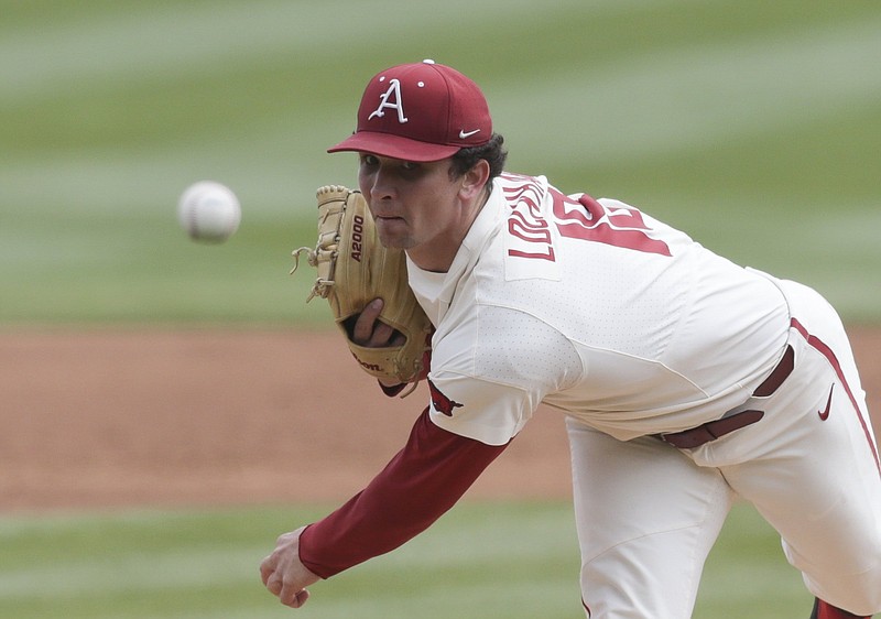 Arkansas Lael Lockhart (18) throws a pitch, Saturday, April 3, 2021 during the second inning of a baseball game at Baum-Walker Stadium in Fayetteville. Check out nwaonline.com/210404Daily/ for today's photo gallery. .(NWA Democrat-Gazette/Charlie Kaijo)