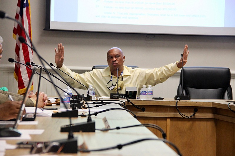 Jefferson County Judge Gerald Robinson explains that the ordinance to establish a permit for hauling companies would be $50 per worksite. 
(Pine Bluff Commercial/Eplunus Colvin)