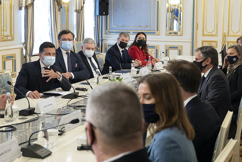 Ukrainian President Volodymyr Zelenskyy (left) and U.S. Secretary of State Antony Blinken (second from right) attend Thursday talks in Kyiv, Ukraine.
(AP/Ukrainian Presidential Press Office)
