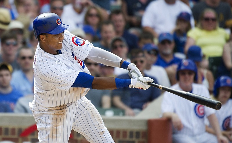 Starlin Castro of the Chicago Cubs hit a three-run home run in his first major-league at-bat on this date in 2010 and drove in a record six runs in a 14-7 victory over the Cincinnati Reds.
(AP file photo)