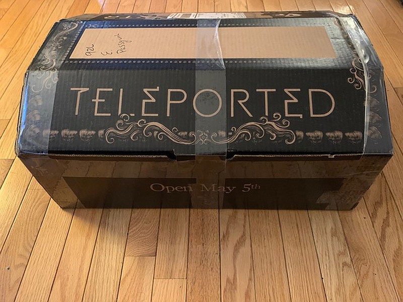 “Teleporters” — virtual attendees — participating in this year’s True/False Film Festival didn’t miss out on the traditional swag — they were sent a load of goodies in this casket-looking box.
(Special to the Democrat-Gazette/Ella Marchant)

CORRECTION: An earlier version of this caption misstated the name of the photographer.