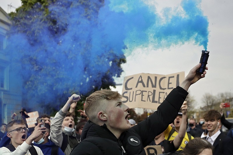 Chelsea fans protest April 20 outside London’s Stamford Bridge stadium against Chelsea’s decision to be included among the clubs attempting to form a new European Super League. Nine of the 12 clubs involved agreed to a peace deal with UEFA that includes fines of millions of dollars.
(AP file photo)