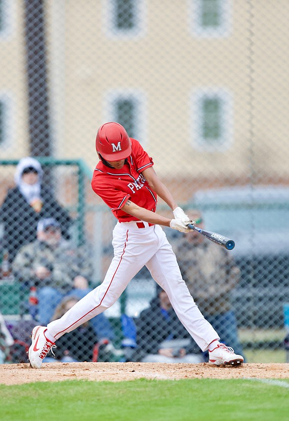 Magnolia’s Jayson Thomas had the biggest hit for the Panthers in the South Region tournament Thursday. His RBI-triple help Magnolia get the 4-2 win. The Panthers play Bauxite today and will compete in the title game at 2:30 p.m. Saturday if they win. (Photo by Bill Nielsen)